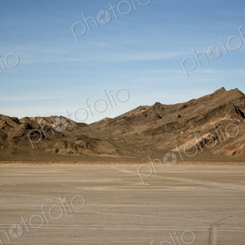 Salt flats and dry mountains, Bonnaville Salt Flats, Utah, United States Salt flats and dry mountains, Bonnaville Salt Flats, Utah, United States