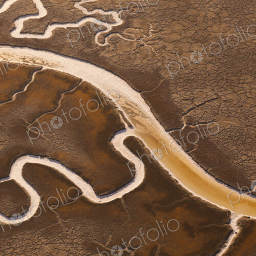 San Francisco Bay salt flats with glistening water channels in California, USA