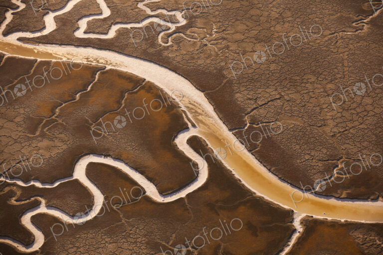 San Francisco Bay salt flats with glistening water channels in California, USA