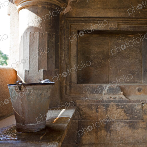 Sas- Bahu Temple in Udaipur, a small pavilion with traditional water tank and washing…