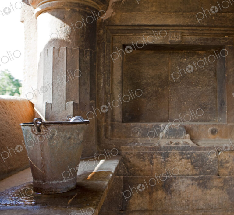 Sas- Bahu Temple in Udaipur, a small pavilion with traditional water tank and washing…