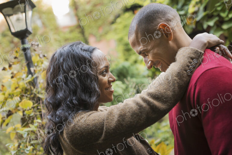 Scenes from urban life in New York City. A man and a woman, a couple face to face,…