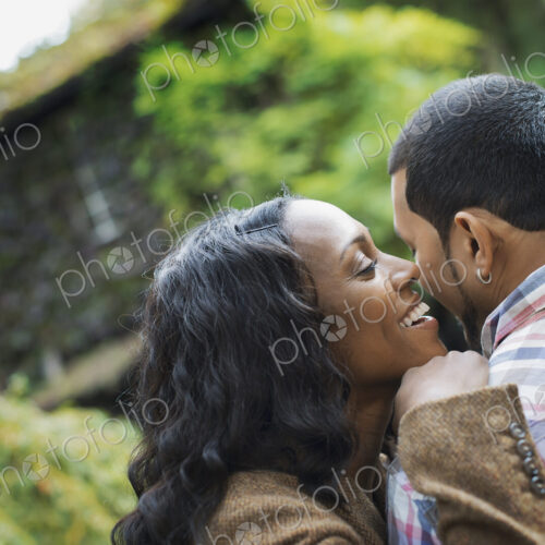 Scenes from urban life in New York City. A man and a woman, a couple hugging each other. Scenes from urban life in New York City. A man and a woman, a couple hugging each other.