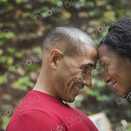 Scenes from urban life in New York City. A man and a woman, a couple looking closely… Scenes from urban life in New York City. A man and a woman, a couple looking closely…