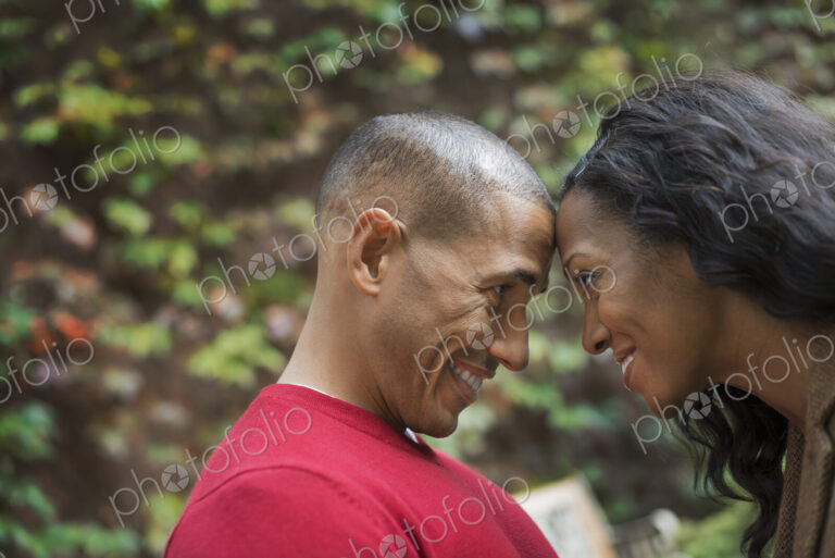 Scenes from urban life in New York City. A man and a woman, a couple looking closely…