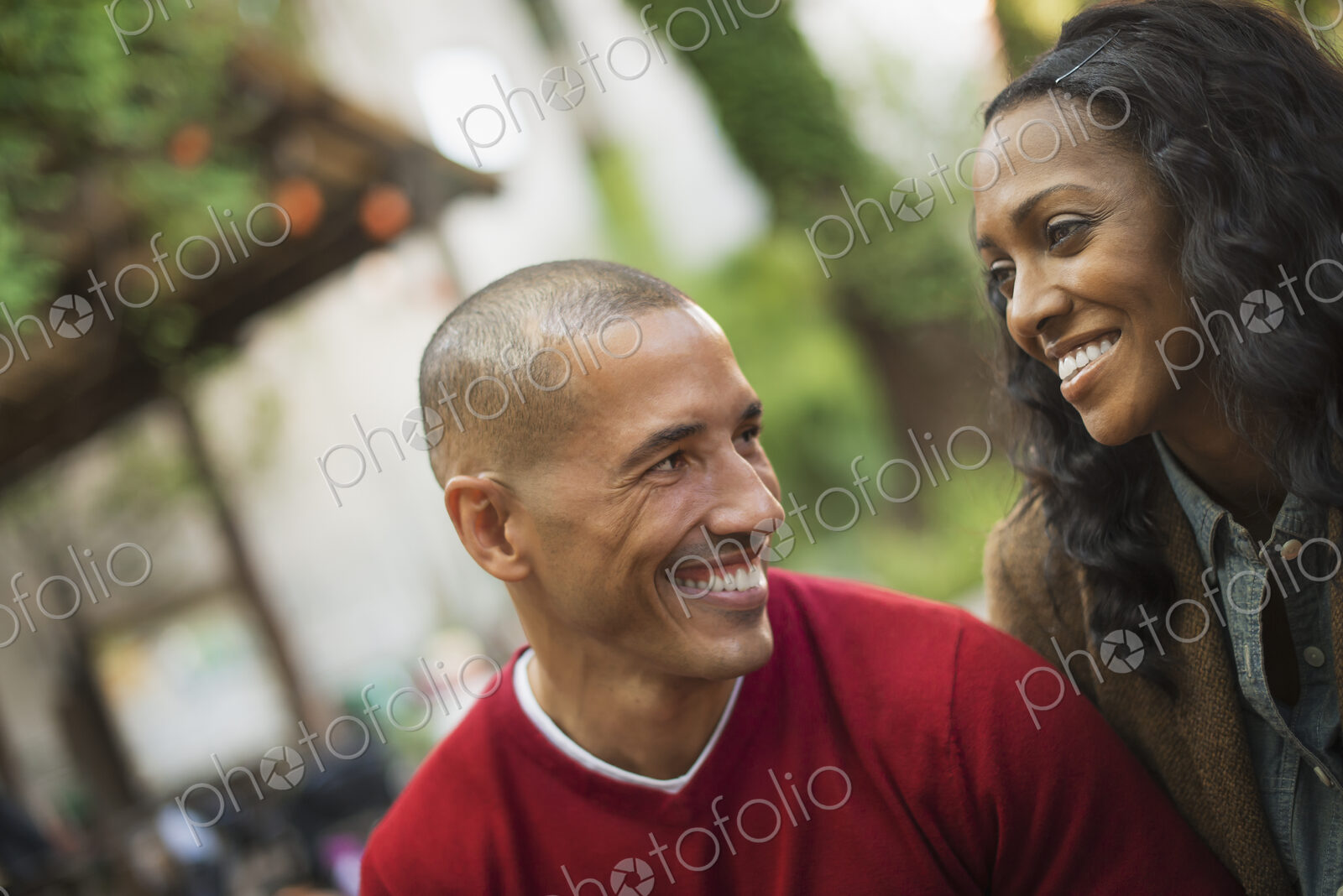 Scenes from urban life in New York City. A man and a woman, a couple. Looking at each…
