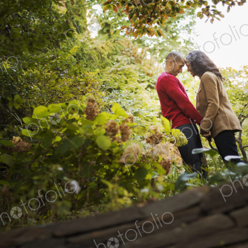 Scenes from urban life in New York City. A park with trees. A man and a woman, a… Scenes from urban life in New York City. A park with trees. A man and a woman, a…