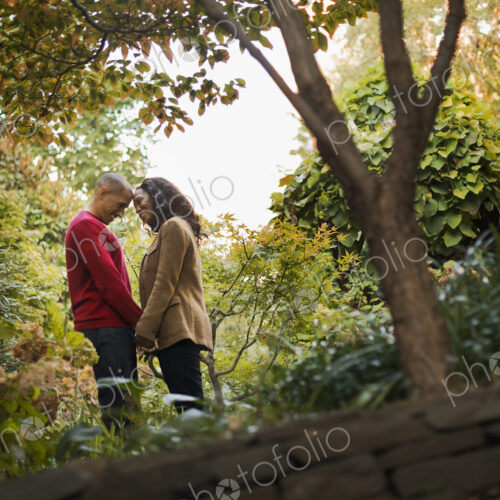 Scenes from urban life in New York City. A park with trees. A man and a woman, a… Scenes from urban life in New York City. A park with trees. A man and a woman, a…