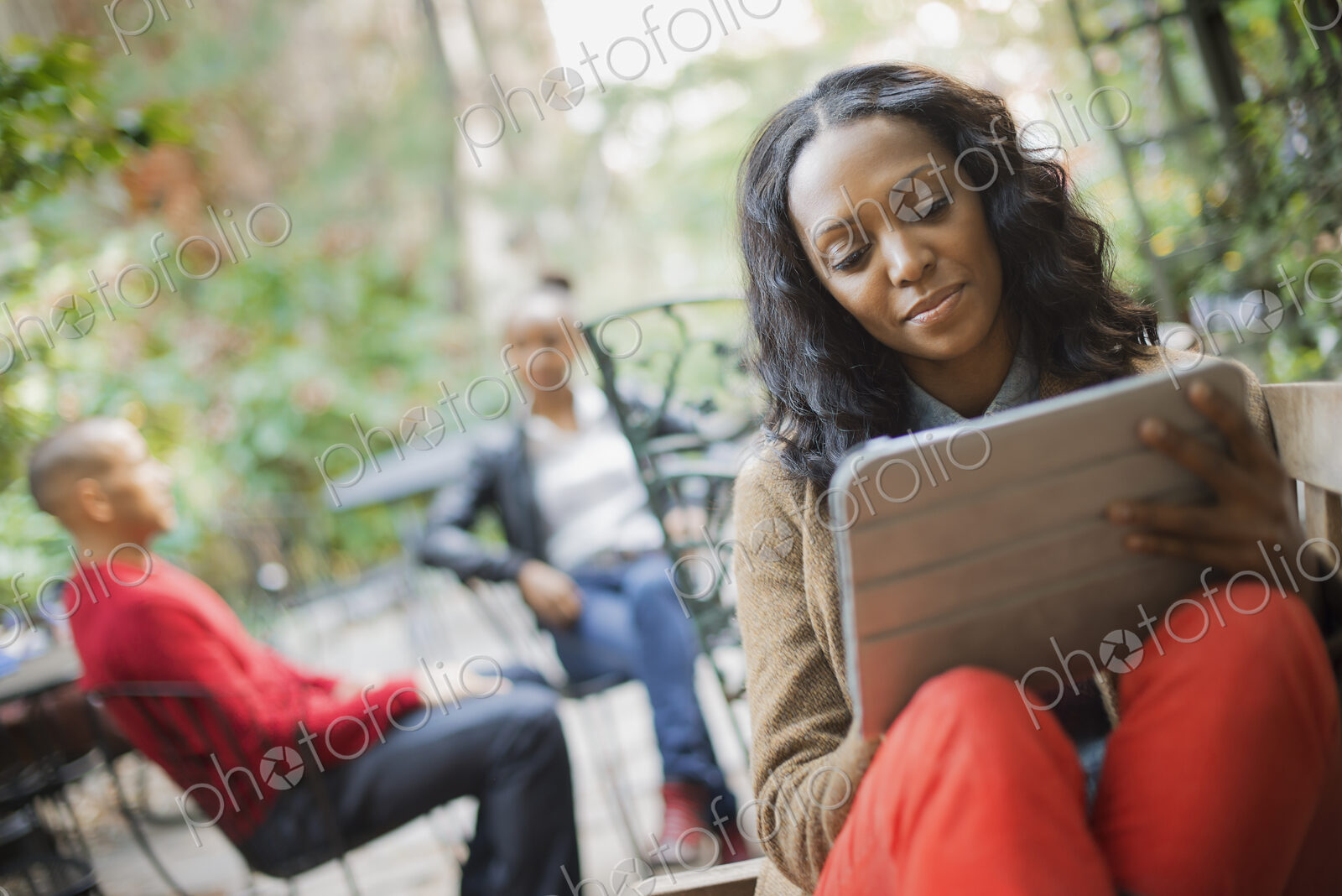 Scenes from urban life in New York City. Outdoors. Two people in background. A woman…