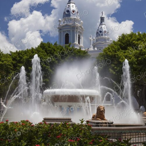 Scenic view of the Fountain of the Lions with the twin towers of the historic Ponce… Scenic view of the Fountain of the Lions with the twin towers of the historic Ponce…