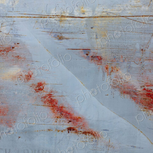 Scratch and rust markings on old metal wall Scratch and rust markings on old metal wall