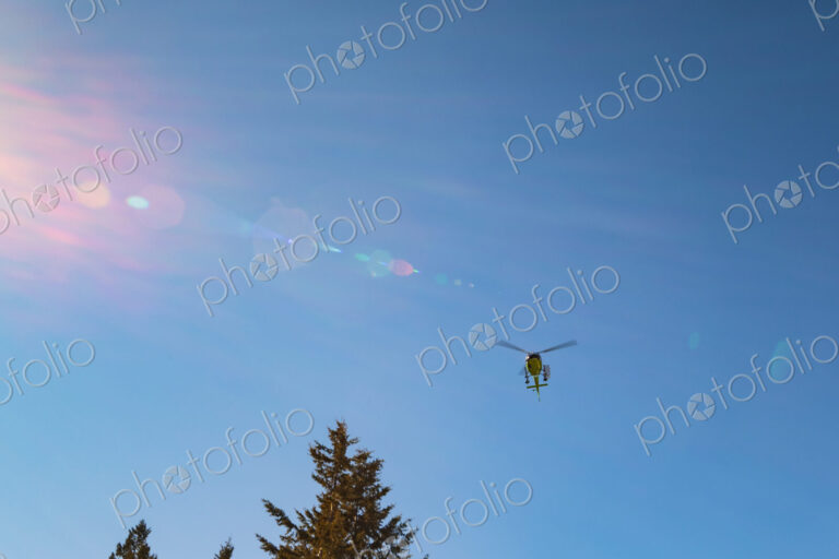 Search and rescue helicopter over the North Cascades, WA USA