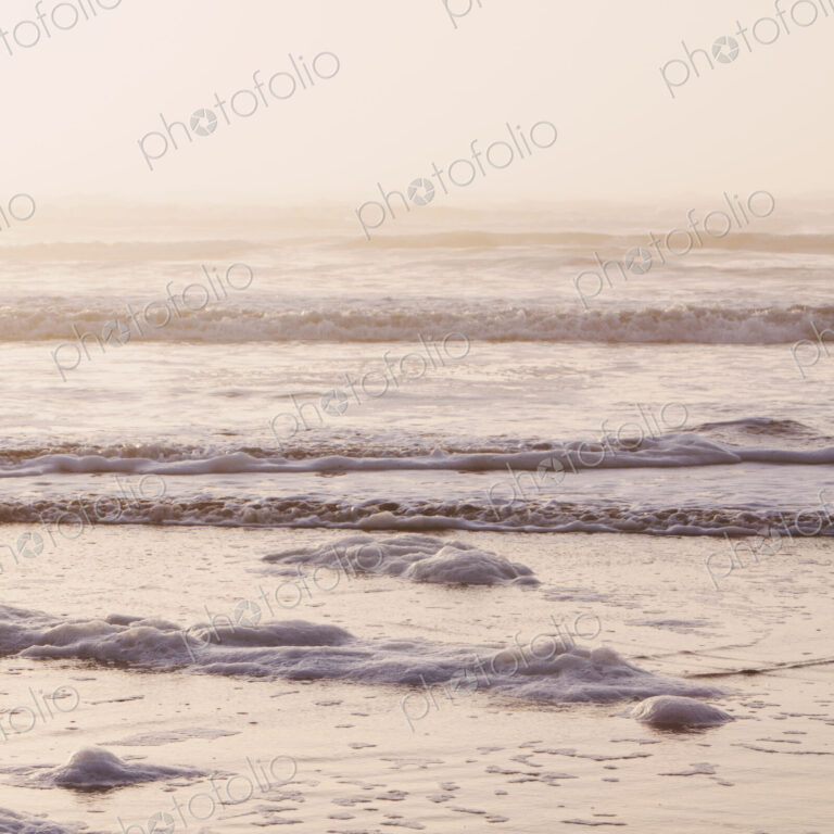 Seascape at dusk, Waves breaking on the shore. Tidal zone. Off the shores of the…