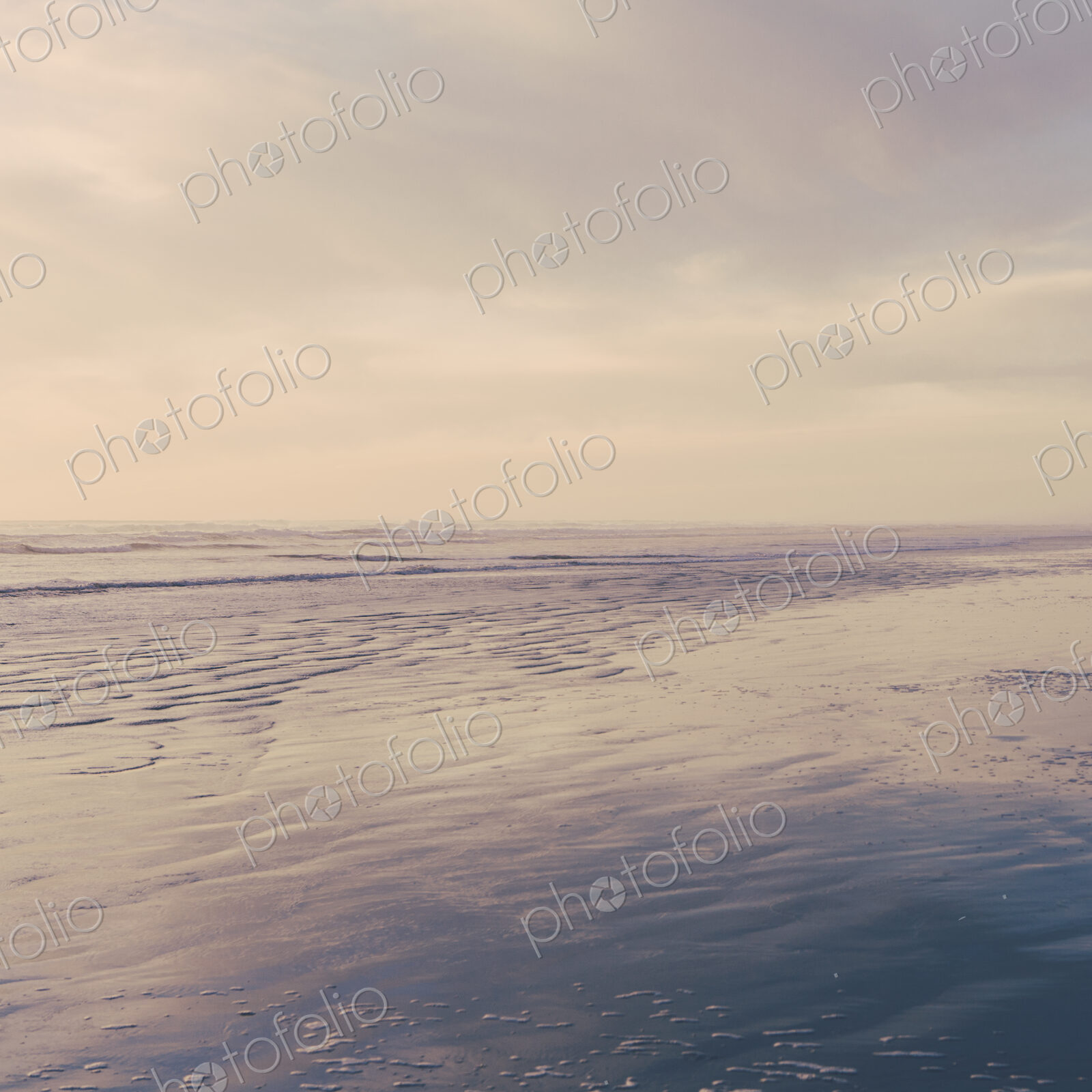 Seascape at dusk off the shores of the Olympic National Park coastline. Ripples on the…