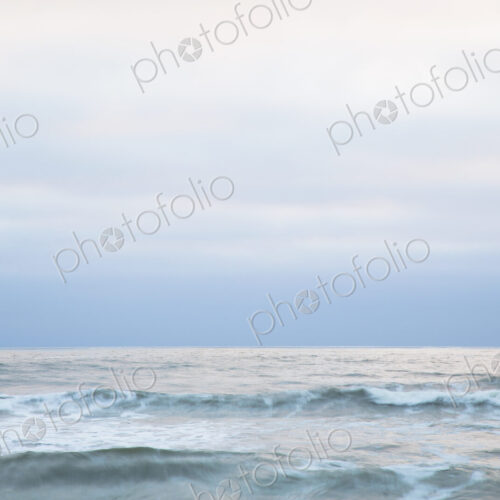 Seascape at dusk on the Pacific Ocean coastline. Seascape at dusk on the Pacific Ocean coastline.