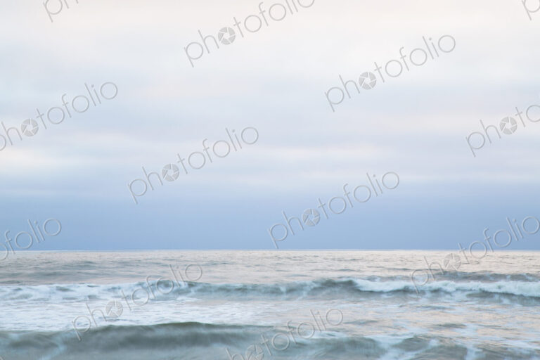 Seascape at dusk on the Pacific Ocean coastline.