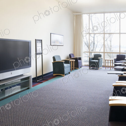 Seats and television in lounge Seats and television in lounge