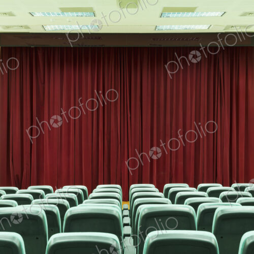 Seats in empty auditorium Seats in empty auditorium