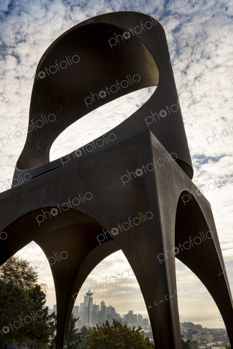 Seattle skyline and the Space Needle seen through the Changing Form sculpture by…