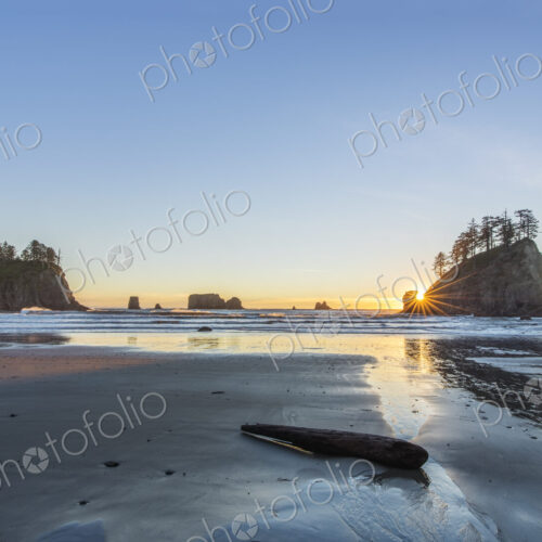 Second Beach at low tide, seastacks offshore silhouetted at sunset. Second Beach at low tide, seastacks offshore silhouetted at sunset.