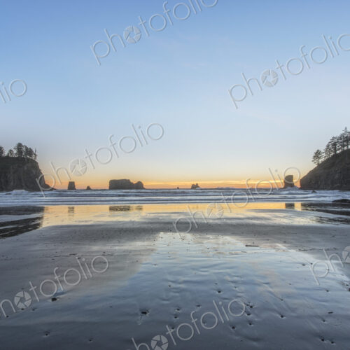 Second Beach at low tide, seastacks offshore silhouetted at sunset. Second Beach at low tide, seastacks offshore silhouetted at sunset.