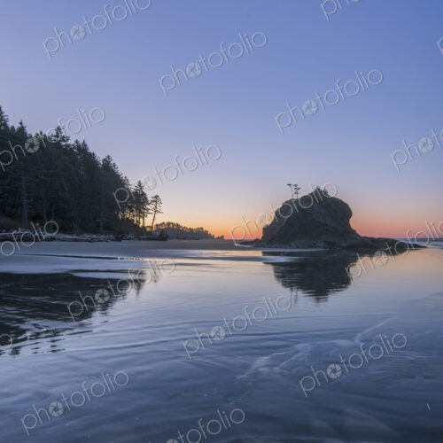 Second Beach at low tide, seastacks offshore silhouetted at sunset. Second Beach at low tide, seastacks offshore silhouetted at sunset.