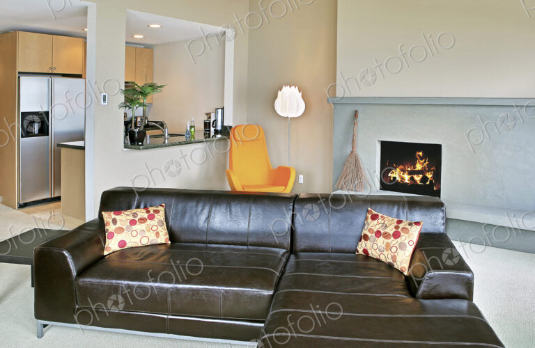 Sectional sofa and kitchen in modern home