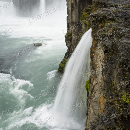 Selfoss waterfall, a cascade of water over a sheer cliff.