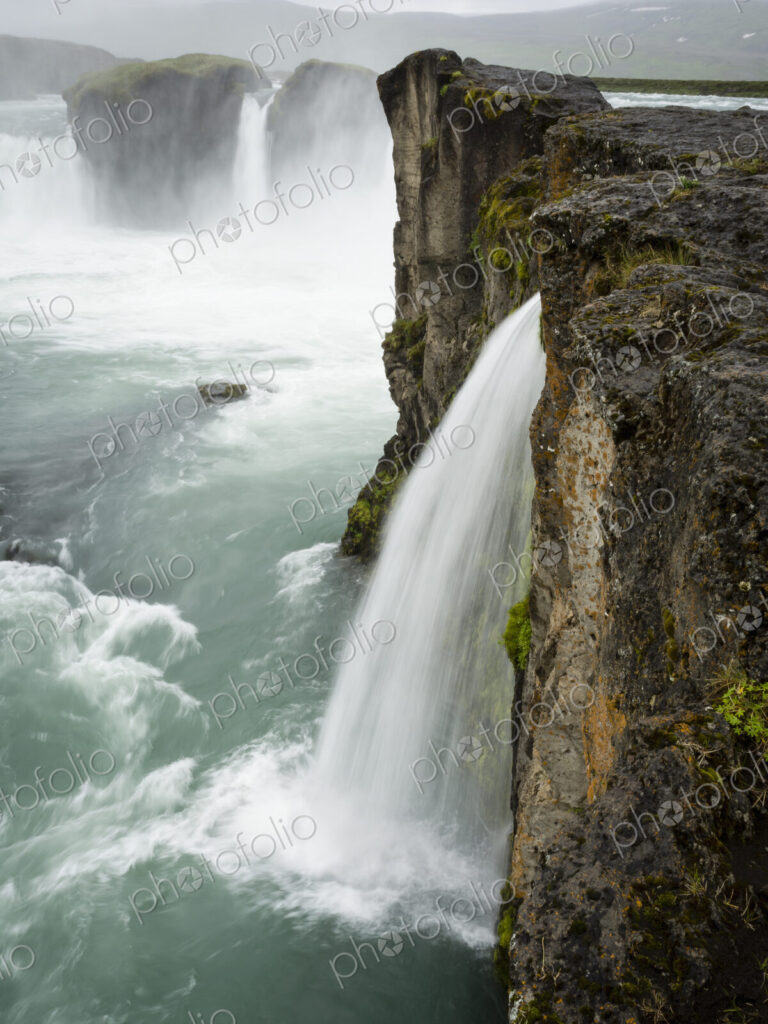 Selfoss waterfall, a cascade of water over a sheer cliff.