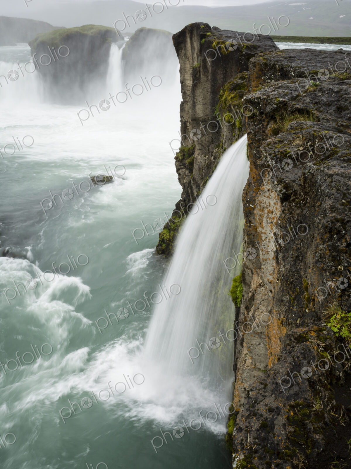 Selfoss waterfall, a cascade of water over a sheer cliff.