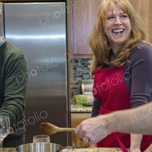 Seniors at a home dinner party.
