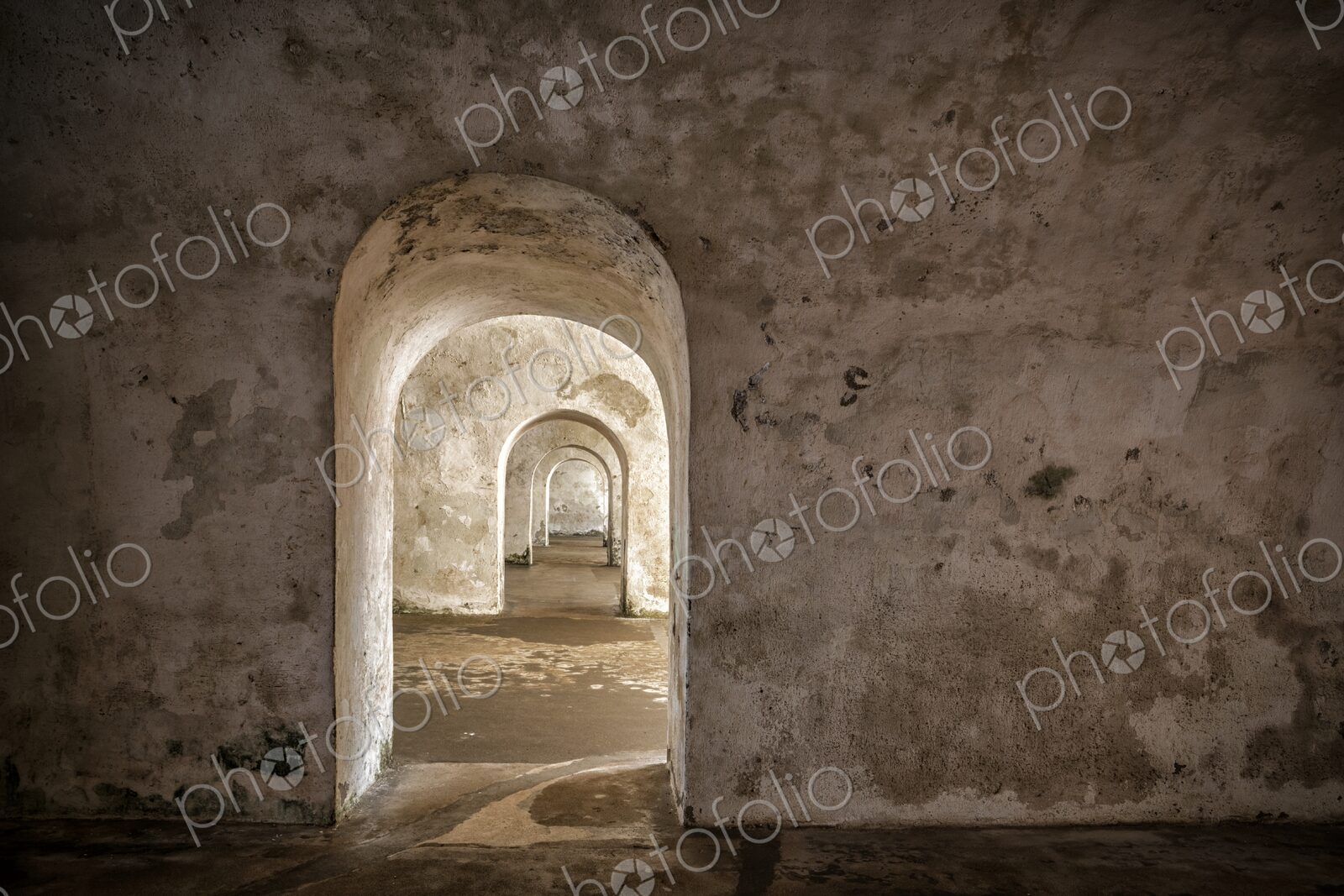 Series of arched doorways inside Castillo San Felipe del Morro in San Juan, Puerto…