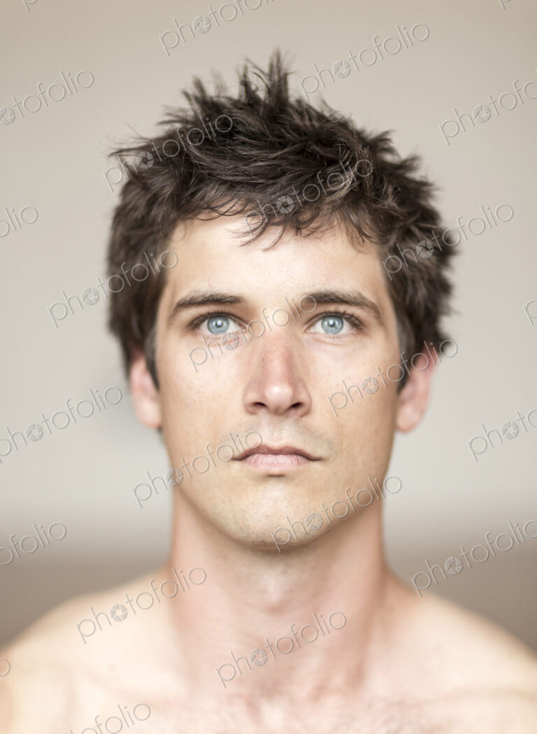 Serious man with messy hair