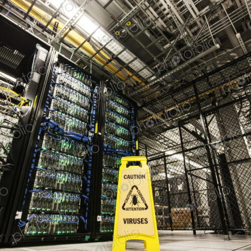 Servers on racks in a large computere server farm. Servers on racks in a large computere server farm.