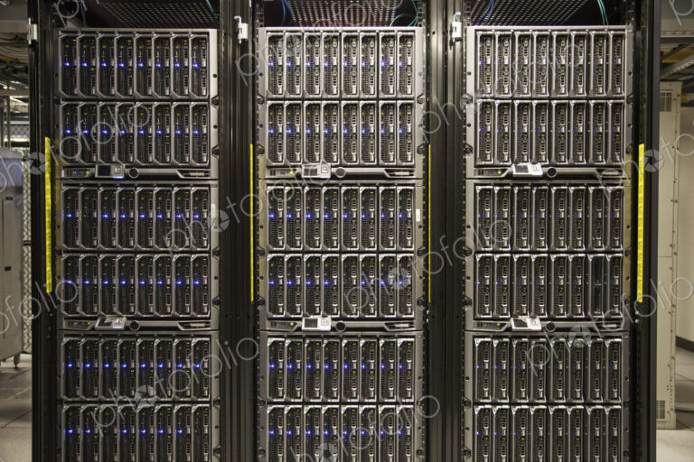 Servers on racks in a large computere server farm.
