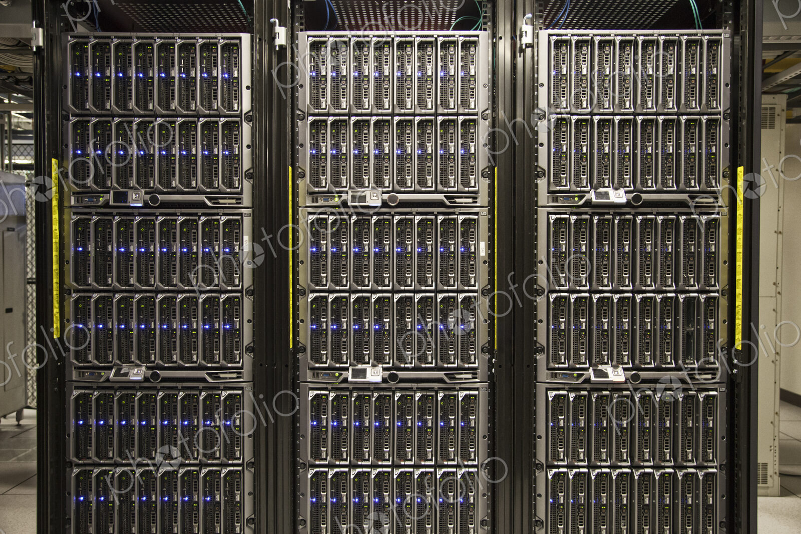 Servers on racks in a large computere server farm.