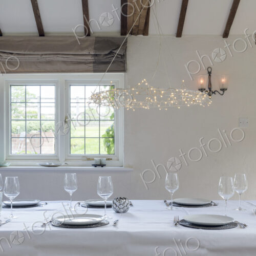 Set table in dining room Set table in dining room