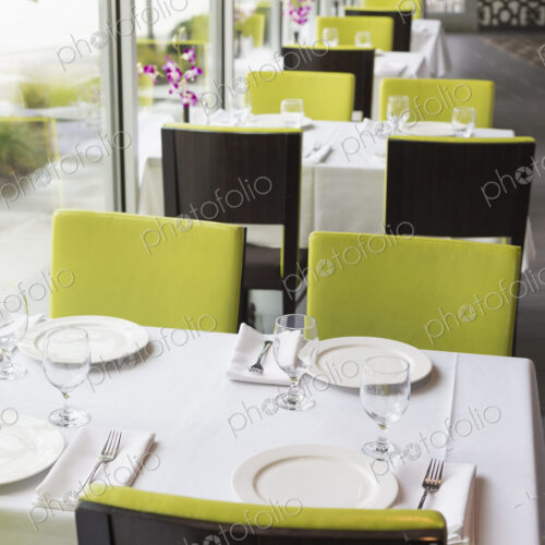 Set tables in Thai restaurant Set tables in Thai restaurant