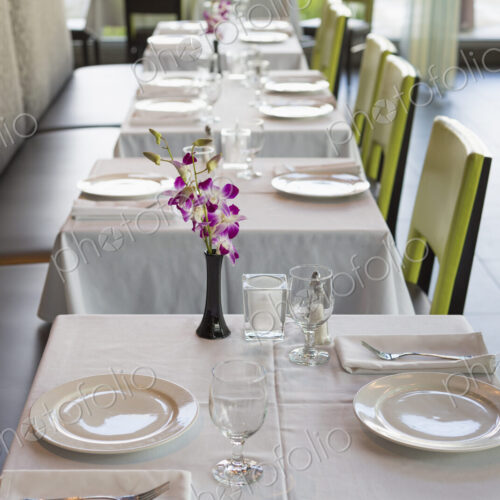 Set tables in Thai restaurant Set tables in Thai restaurant