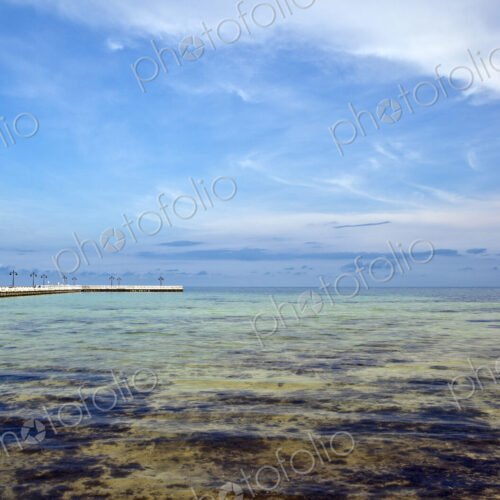 Shallow Coastal Waters under a Blue Sky Shallow Coastal Waters under a Blue Sky
