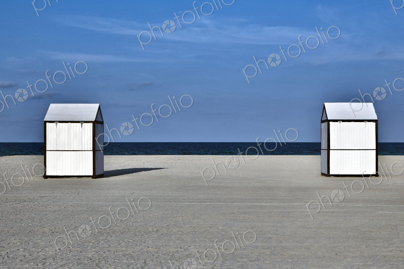 Sheds on a Deserted Beach