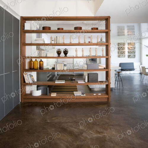 Shelving unit in open plan apartment.