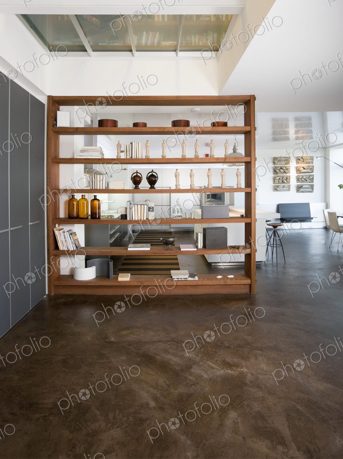 Shelving unit in open plan apartment.