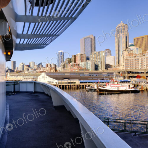 Ship deck in Seattle harbor overlooking cityscape, Washington, United States Ship deck in Seattle harbor overlooking cityscape, Washington, United States