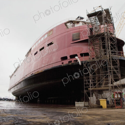 Ship on Dry Dock, a large vessel beached for repair out of the water