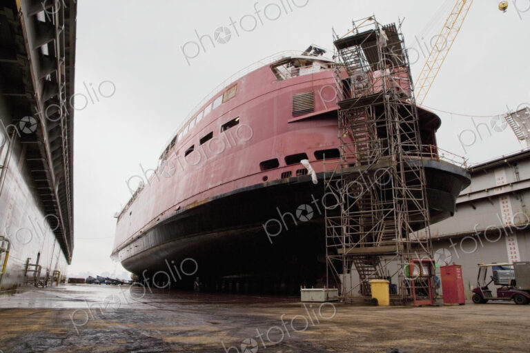 Ship on Dry Dock, a large vessel beached for repair out of the water