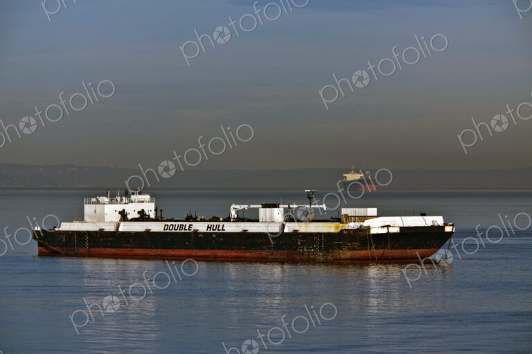 Shipping Vessel Floating in Water