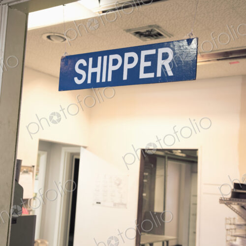 Shipping department sign in warehouse. Shipping department sign in warehouse.