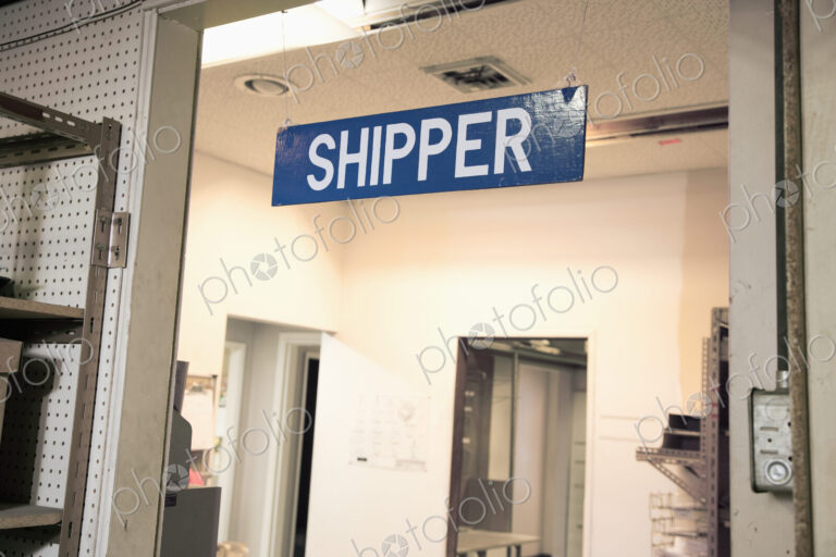 Shipping department sign in warehouse.