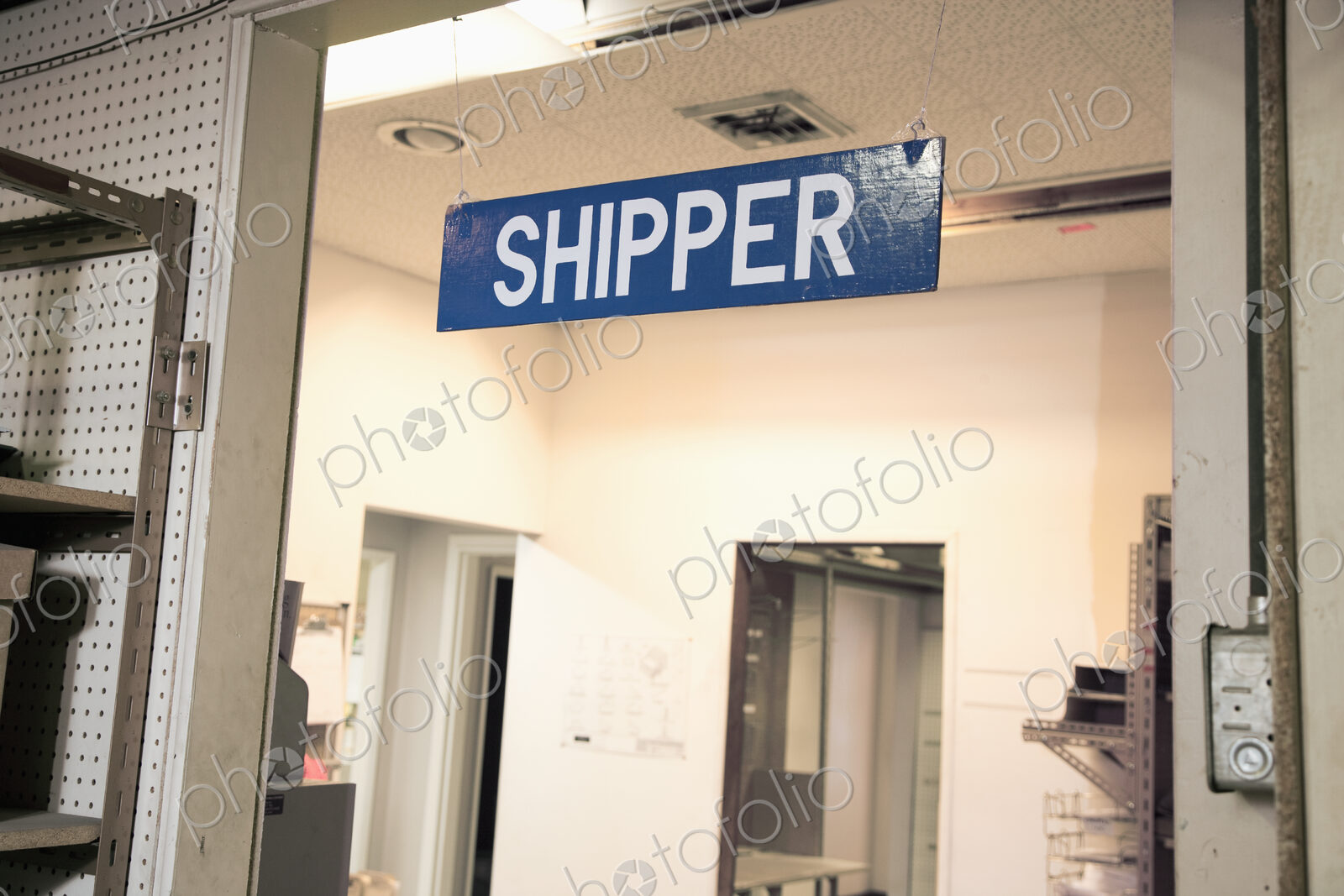 Shipping department sign in warehouse.
